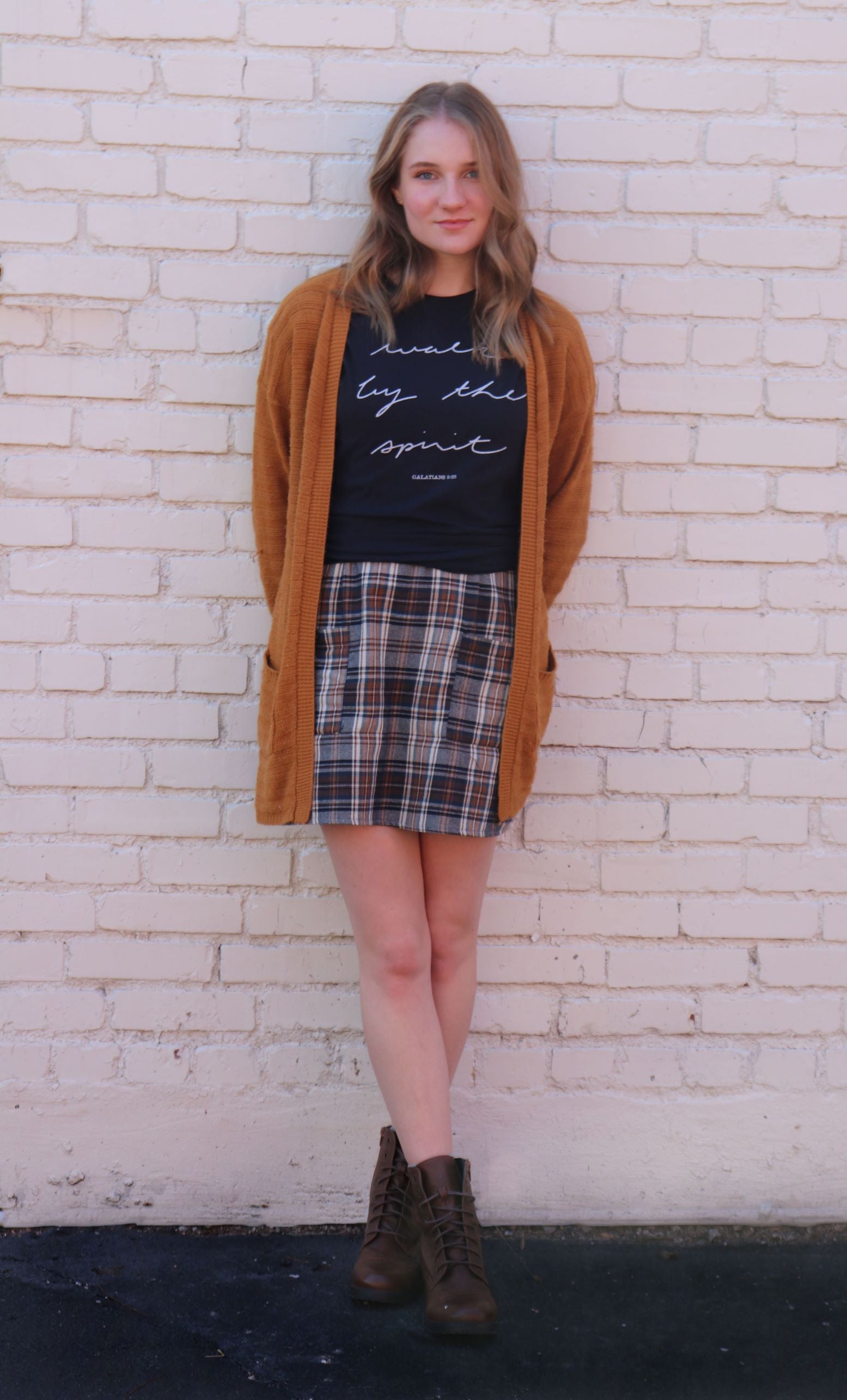 Woman in black "Walk by the Spirit, Galatians 5:25" Christian t shirt.